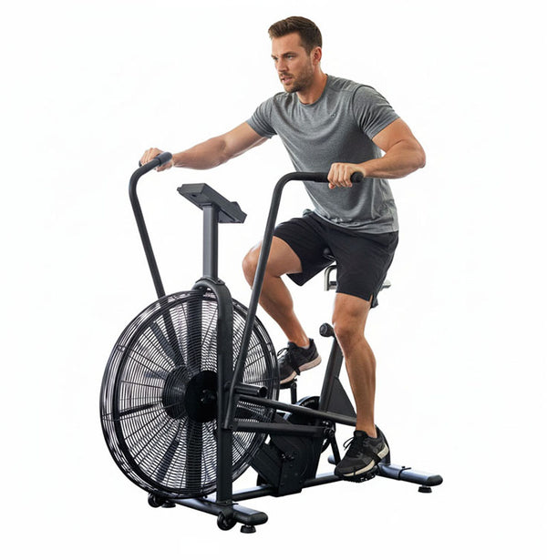 Person training on an air bike
