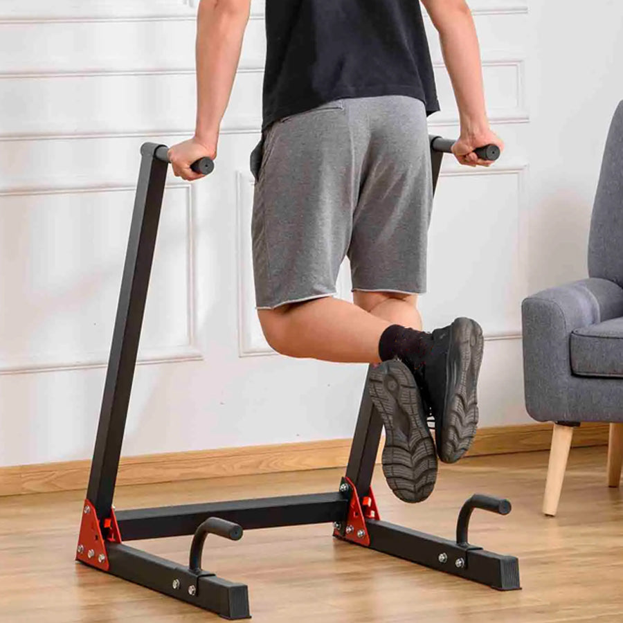 Person using a freestanding dip station
