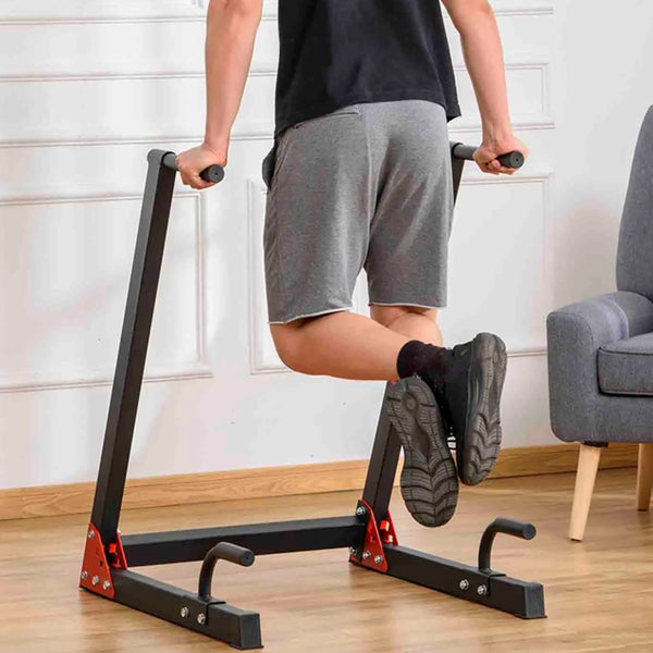 Person using a freestanding dip station