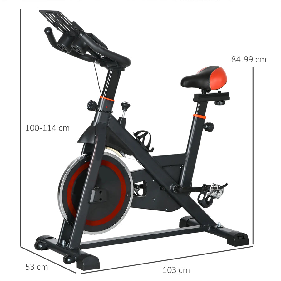 Exercise bike with dumbbells at the rear