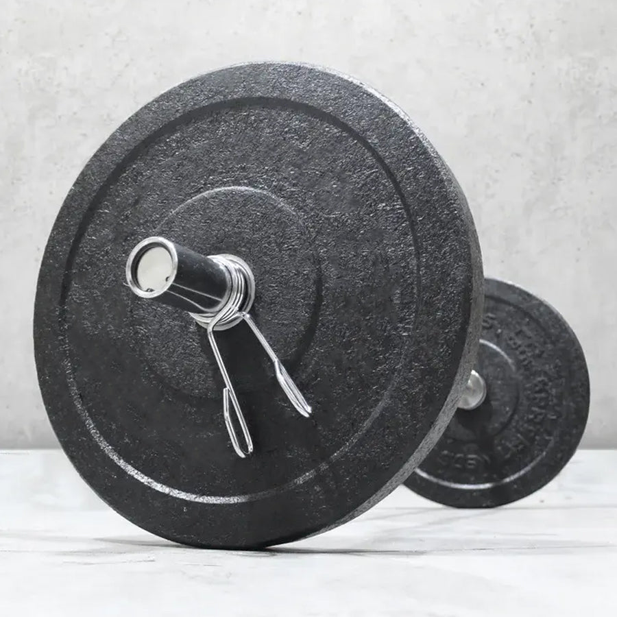 Spring collar fitted to a loaded barbell