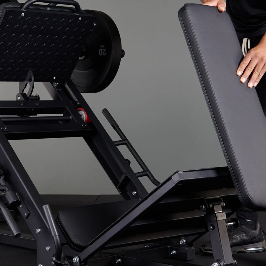 Close-up of leg press machine components