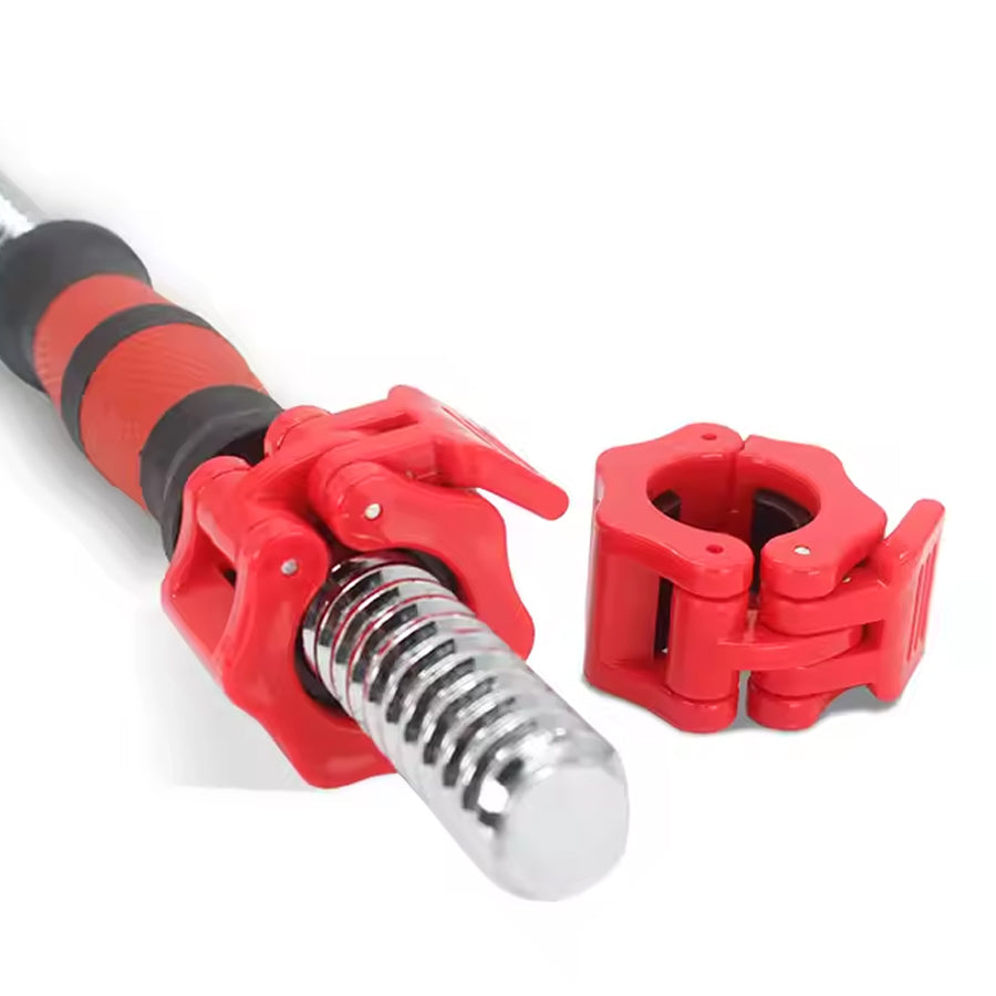 Red clamp fitted around a barbell sleeve