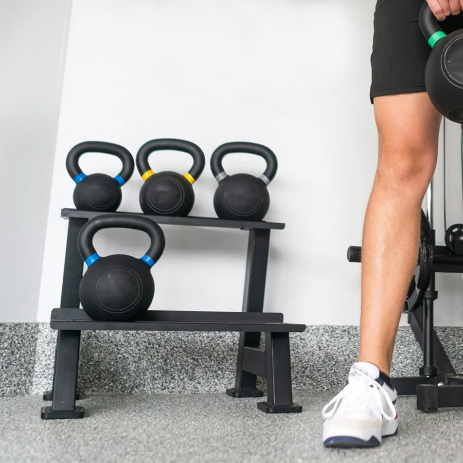 Kettlebells on a two-tier storage rack