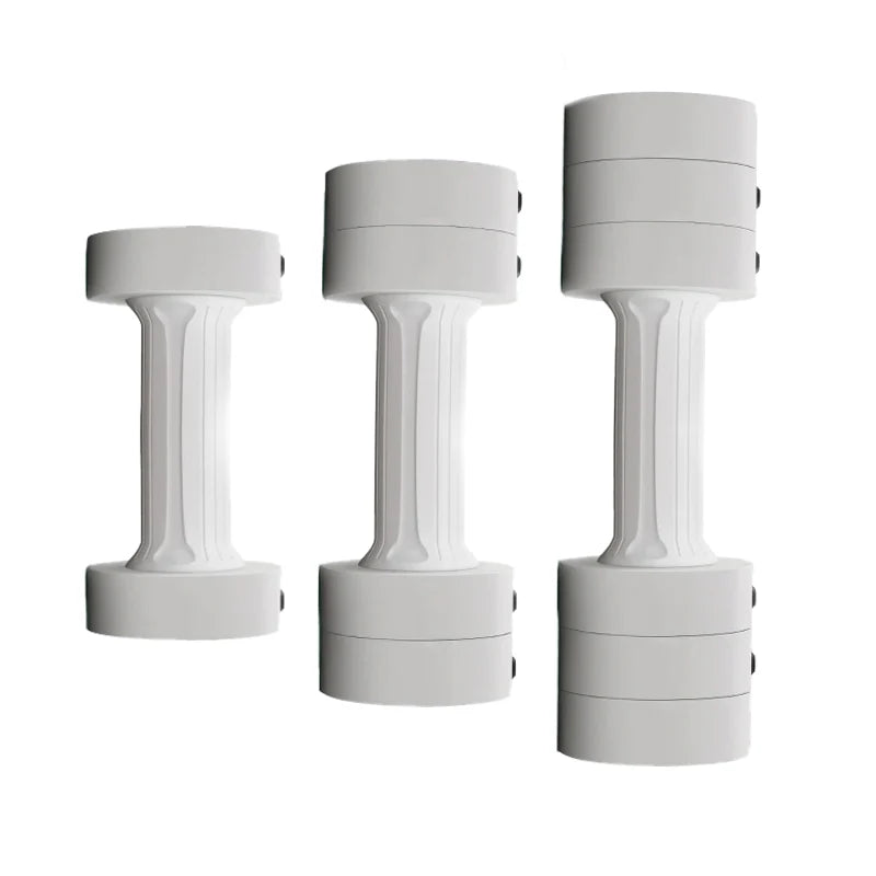 Pair of light-coloured adjustable dumbbells