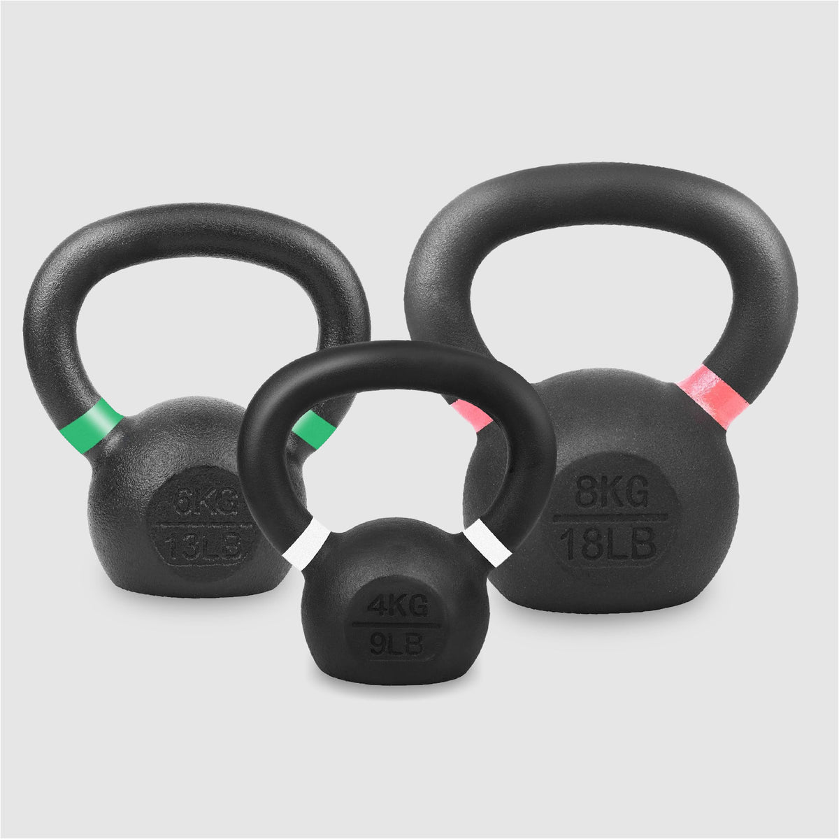 Set of cast iron kettlebells in assorted weights